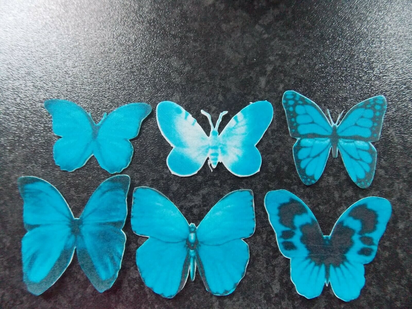 12 Precut Edible Blue Mix(2) Butterflies for cakes and cupcake toppers