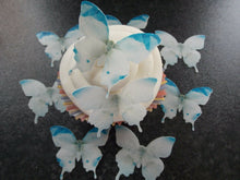 Load image into Gallery viewer, 12 PRECUT Edible white and Blue Butterflies wafer paper cake/cupcake toppers(h)
