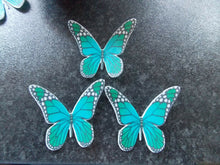 Load image into Gallery viewer, 12 PRECUT Teal Butterflies Edible wafer/rice paper cupcake toppers(E)
