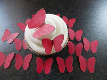 Load image into Gallery viewer, 24 Small PRECUT Bright Pink Edible wafer paper Butterflies cake/cupcake toppers

