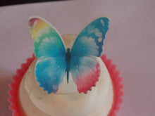 Load image into Gallery viewer, 12 Precut Edible Blue (2) Butterflies for cakes and cupcake toppers

