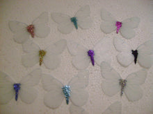 Load image into Gallery viewer, 12 Precut Edible Glittery White Butterflies for cake/cupcake toppers
