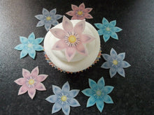 Load image into Gallery viewer, 12 PRECUT Edible Pastel Star Flowers wafer/rice paper cake/cupcake toppers
