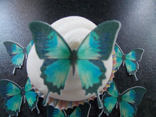 Load image into Gallery viewer, 12 PRECUT Teal Butterflies Edible wafer/rice paper cupcake toppers (D)
