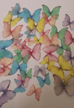 Load image into Gallery viewer, 48 Precut Edible Pastel Mix Butterflies for cakes and cupcake toppers
