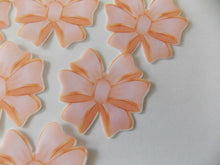 Load image into Gallery viewer, 12 PRECUT Edible Pink Bows wafer/rice paper cake/cupcake toppers
