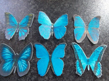 Load image into Gallery viewer, 24 Small Precut Edible Blue Mix(2) Butterflies for cakes and cupcake toppers
