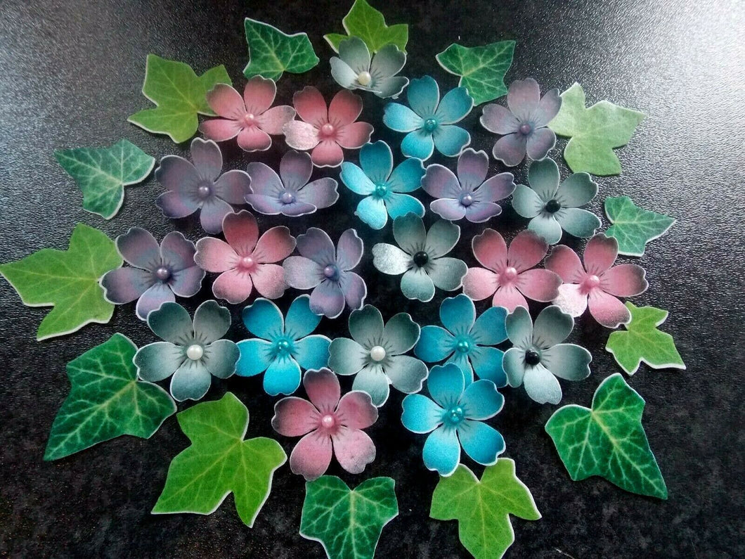 24 small edible wafer paper flowers with leaves for cakes/cupcakes (2)
