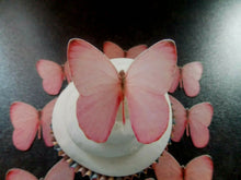 Load image into Gallery viewer, 12 PRECUT Edible Pink (8) Butterflies wafer/rice paper cake/cupcake toppers
