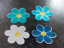 Load image into Gallery viewer, 16 PRECUT Edible Blue Flowers wafer/rice paper cake/cupcake toppers
