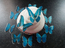 Load image into Gallery viewer, 24 Small Precut Edible Blue Mix(2) Butterflies for cakes and cupcake toppers
