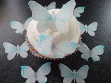 Load image into Gallery viewer, 16 PRECUT Edible Baby Blue Butterflies wafer/rice paper cake/cupcake toppers
