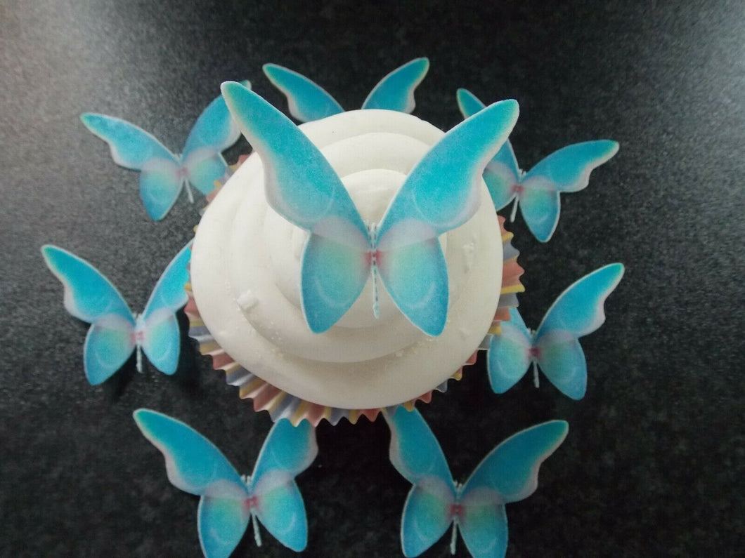 12 PRECUT Edible Blue Butterflies wafer paper cake/cupcake toppers(g)