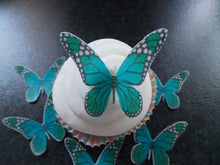 Load image into Gallery viewer, 12 PRECUT Teal Butterflies Edible wafer/rice paper cupcake toppers(E)
