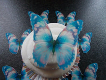 Load image into Gallery viewer, 12 PRECUT Edible Blue Butterfly wafer/rice paper cake/cupcake toppers(a)
