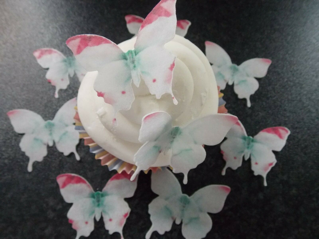 12 PRECUT Edible white and Pink Butterflies wafer paper cake/cupcake toppers(h)