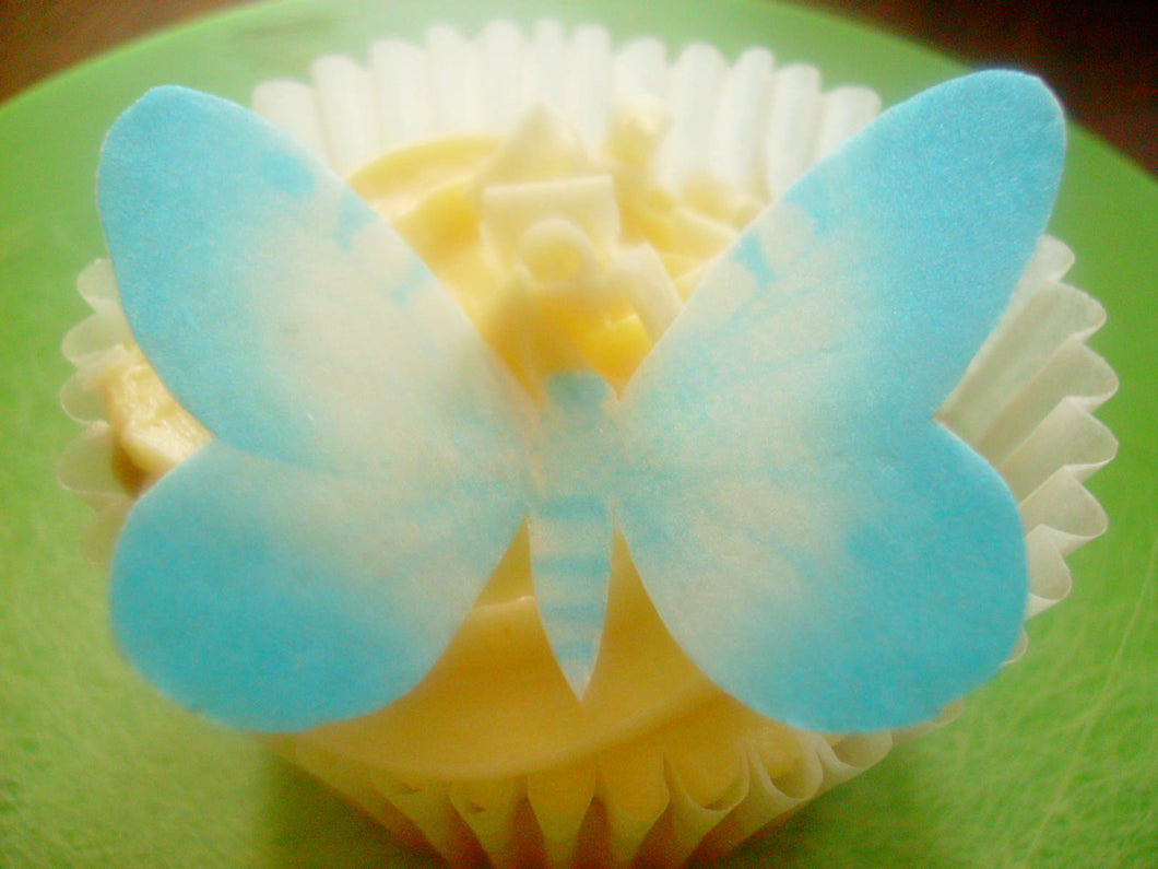 12 Precut Edible Bright Blue butterflies cake/cupcake toppers