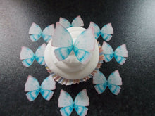 Load image into Gallery viewer, 14 Precut Edible Baby Blue Butterflies for cakes and cupcake toppers
