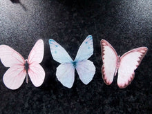 Load image into Gallery viewer, 12 PRECUT Edible Pastel Pink &amp; Blue Butterfly wafer paper cake/cupcake toppers
