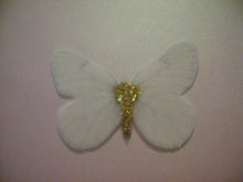 Load image into Gallery viewer, 12 Precut Edible Glittery White Butterflies for cake/cupcake toppers
