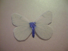 Load image into Gallery viewer, 12 Precut Edible Glittery White Butterflies for cake/cupcake toppers
