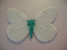 Load image into Gallery viewer, 12 Precut Edible Glittery White Butterflies for cake/cupcake toppers
